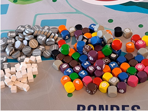 3. Different talents (with their own dice), student assistants and "impact points" are part of the game.